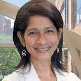 This image shows a headshot-style portrait of Dr. Yvette Calderon.