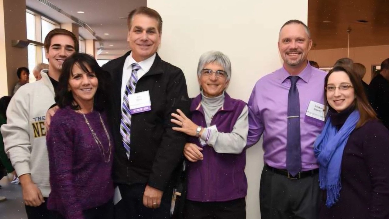 This image shows Bill West (third from left), who talked about his journey as a pancreatic cancer survivor at the annual symposium.
