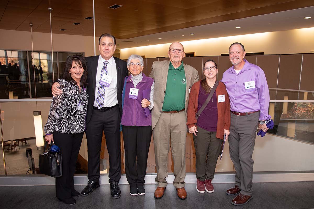 This image shows Bill West (second from left) with a small group of pancreatic cancer survivors at the annual PanCan Symposium.