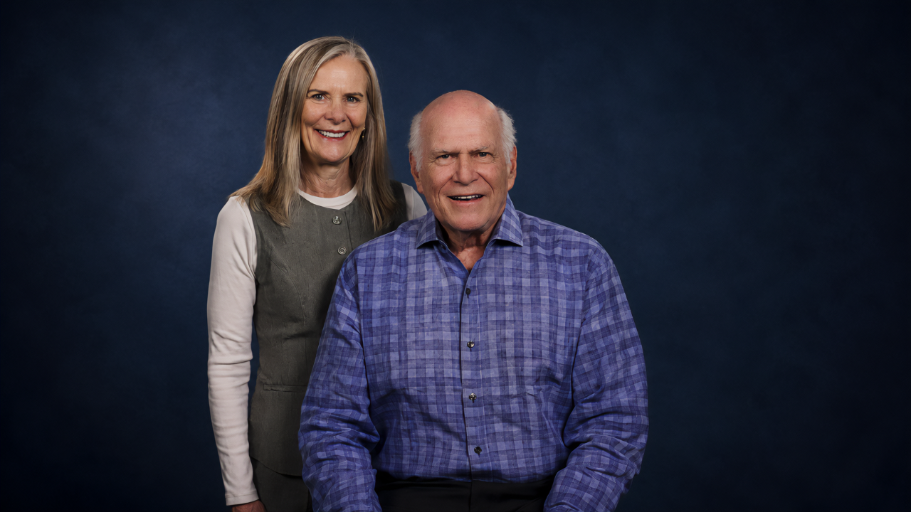 This image shows Charlie Hess (right) with his wife Jan.