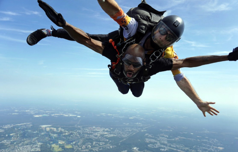 This image shows Jefferson Moss-Magee Rehabilitation patient Delano Turnipseed skydiving.