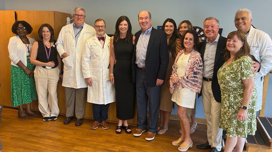 This image shows grateful patient Dennis Fitzpatrick with his family and Jefferson medical team.