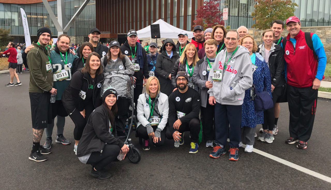 Tom Cicala surrounded by friends and family at the 2019 race